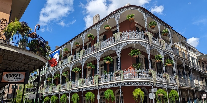 Narrow cobblestone streets and colorful buildings in the French Quarter, one of the historical places in New Orleans.