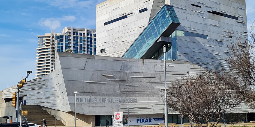 Interactive dinosaur exhibits at the Perot Museum in Dallas, offering a hands-on science experience.