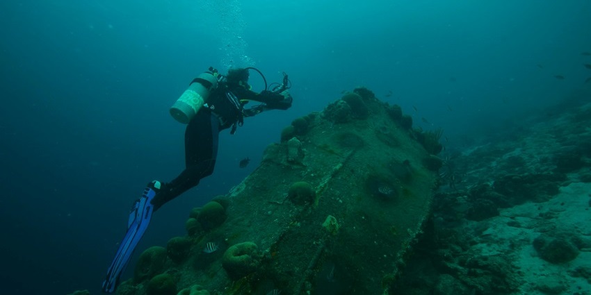 Explore the famous Million Dollar Point wreck site on Espiritu Santo, filled with relics