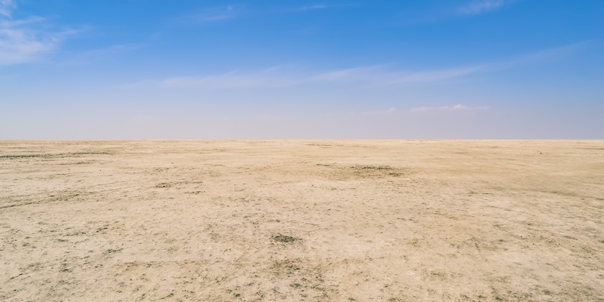 Expansive white desert, which glows during Rann Utsav, with folk music, dance, and tents.