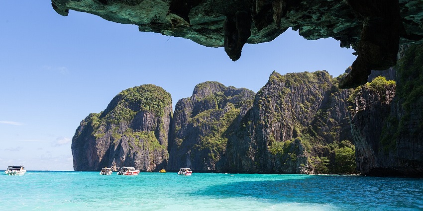 Great Swinton Island, one of the top islands in Myanmar, with sandy shores and a jungle backdrop.