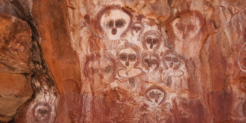 Ancient Aboriginal rock engravings carved into sandstone at Grotto Point in Sydney.