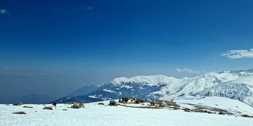 Popular hill station with snow-covered slopes, pine forests, and scenic mountain views