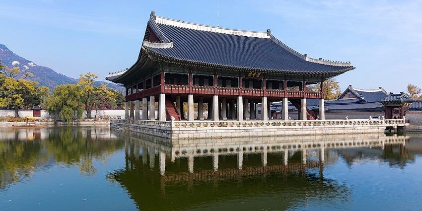 Gyeongbokgung Palace in Seoul with a water body, one of the historical places in South Korea.