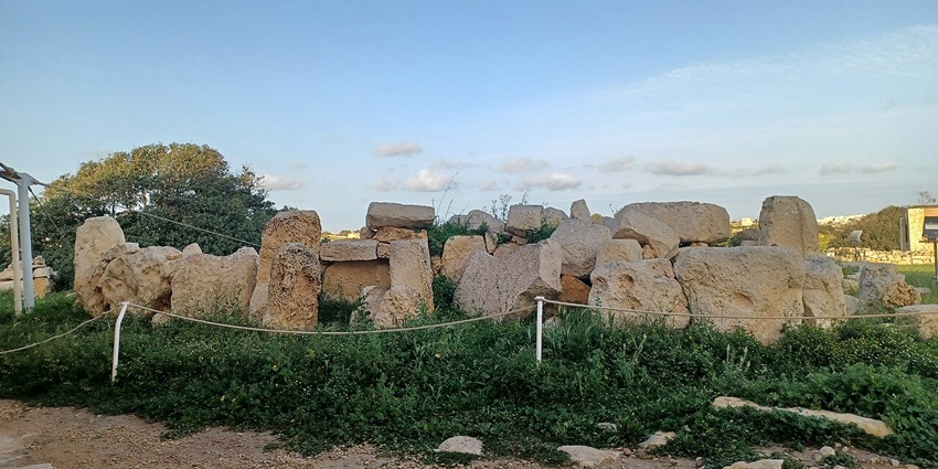 Ħaġar Qim Neolithic temple with multiple big rocks, one of the historical places in Malta