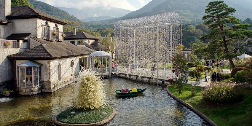 View stunning Venetian-style glass art in an enchanting garden filled with shimmering installations.