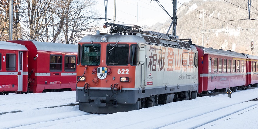 Take Japan’s oldest mountain railway, known for scenic zigzags through forests and valleys.