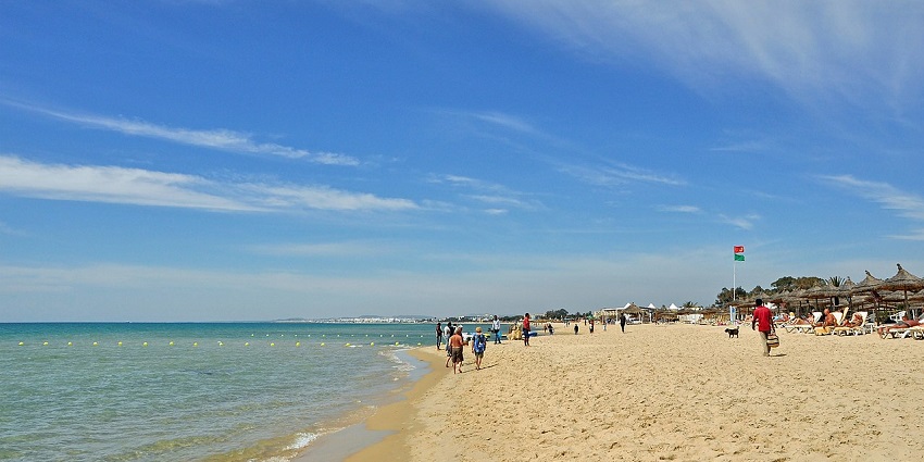 A breathtaking view of Hammamet Beach, where golden sands meet the sparkling blue Mediterranean.