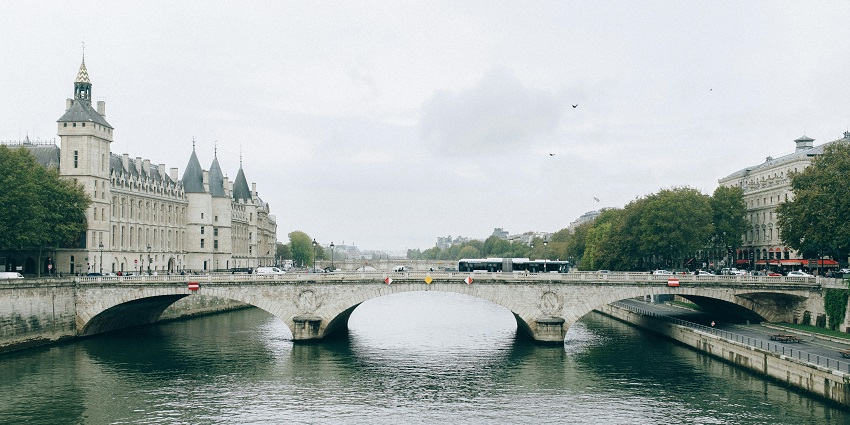 Peaceful morning along the Paris River with reflections of iconic landmarks, what to do in 3 days in Paris