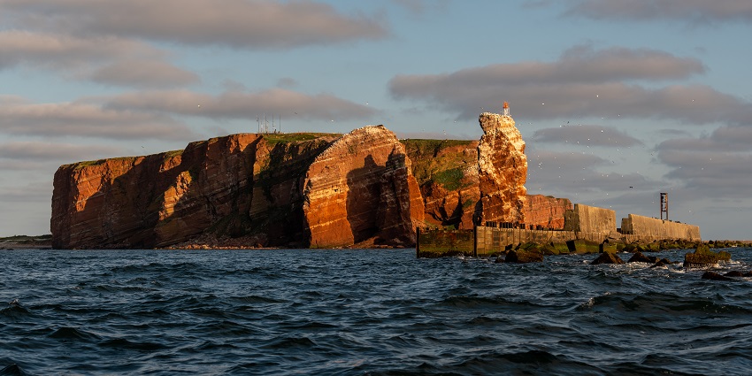Visit red cliffs and seal colonies on this North Sea island, one of the islands in Germany.