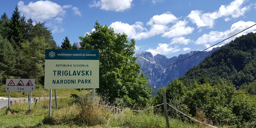 Hiking in Triglav National Park offers stunning trails, rivers, gorges, and alpine meadows in the Julian Alps.