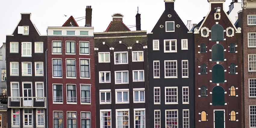 Houses along canals, showing what Amsterdam is famous for in architecture