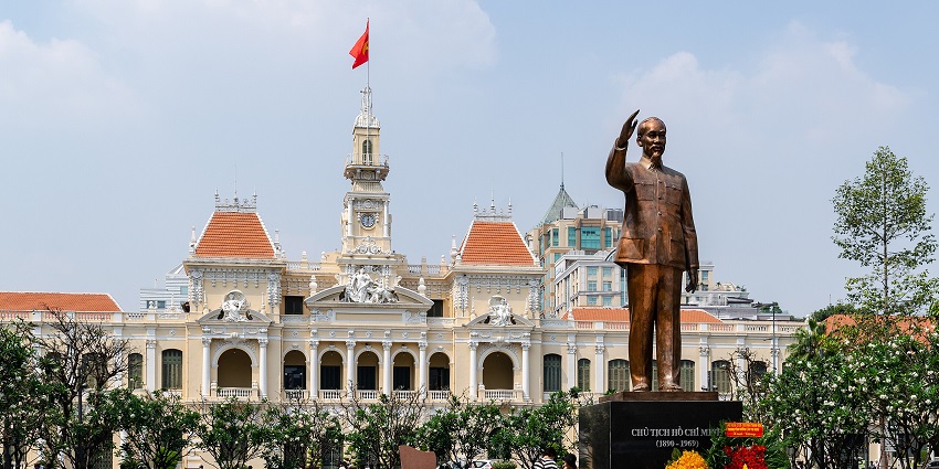 A large bronze statue of Ho Chi Minh gestures, is one of the monuments in Singapore.