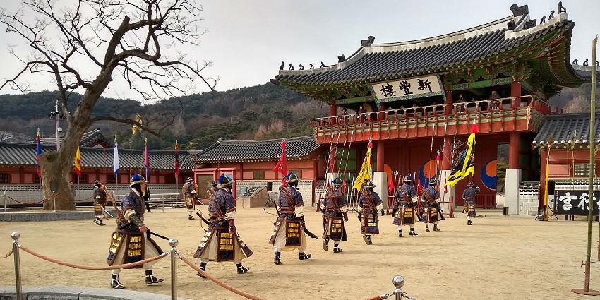Hwaseong Fortress in Suwon with the people in samurai’s outfits, one of the historical places in South Korea.