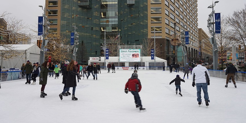 Things to do in Detroit in December include gliding across the festive ice rink at Campus Martius Park, surrounded by holiday lights.