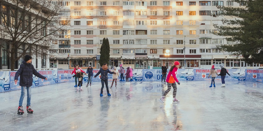 Enjoy winter fun by ice skating in Bucharest’s festive parks, perfect for activities.