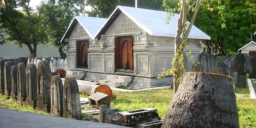 Tombs of the Sultan with detailed architecture and different cemetery tombstones