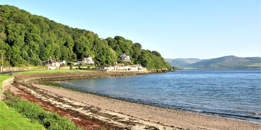 The grand architecture of Mount Stuart on the Isle of Bute is set amidst forested gardens.