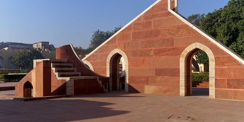 Ancient astronomical instruments stand tall in the historic district, among the places to visit in Jaipur in August.