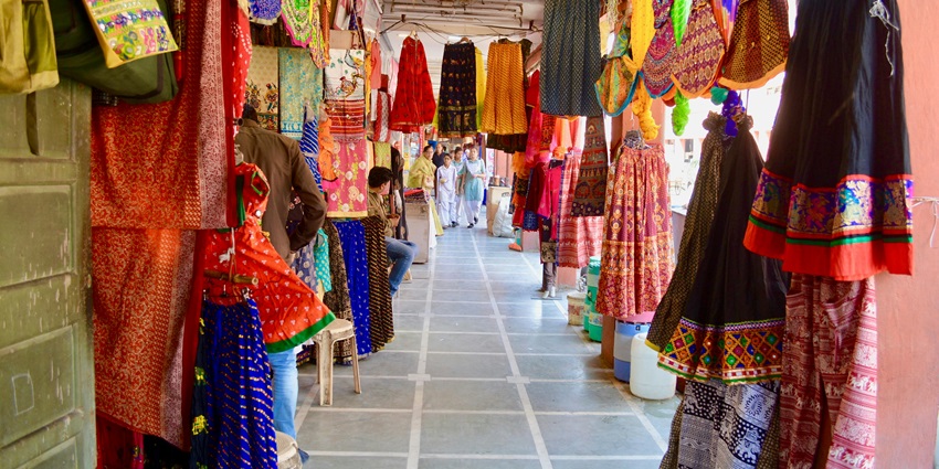 Bustling Jaipur market, alive with colors, textiles, and many more.