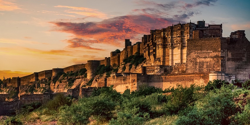 Enchanting view of a fort in Jodhpur adorned with virant monsoon hues in the sky
