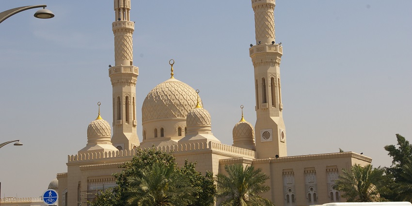 Jumeirah Mosque in Dubai with twin minarets and domes, one of the most beautiful historical places in Dubai.