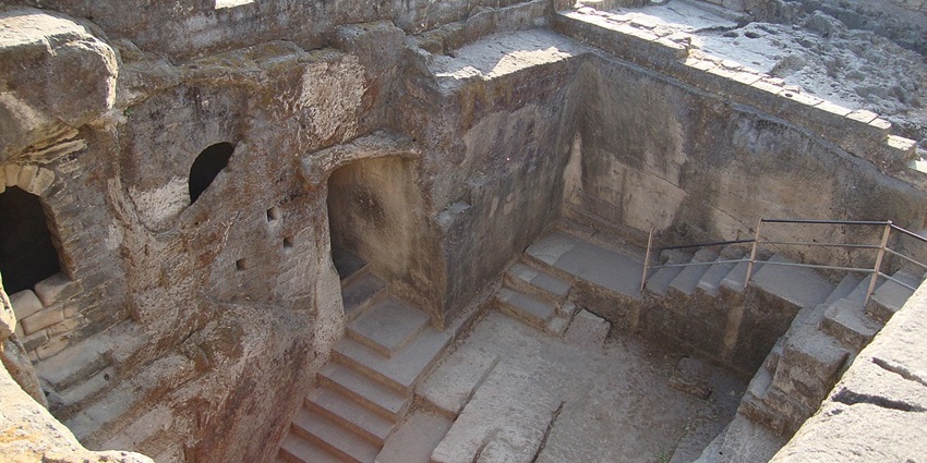 Ancient Buddhist caves in Junagadh reflecting historical rock-cut architecture and heritage.