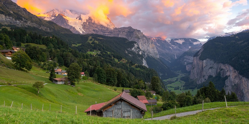 Sunset over Swiss Alps beautifully reflects July in 'Which Month Is Best to Visit Switzerland'