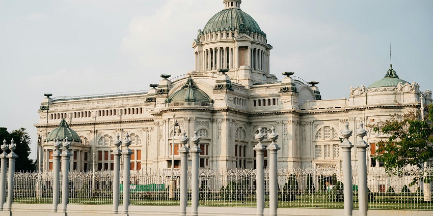 Exterior view of Kanchanaburi War Museum with historical displays and wartime artifacts.