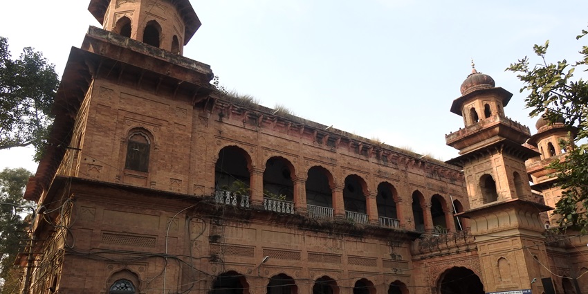 Architecturally rich town with French-style palaces, lush gardens, and royal heritage.