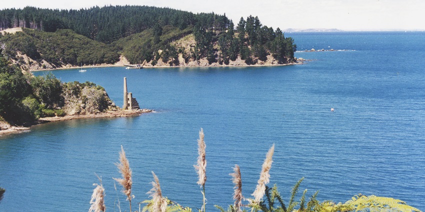 Historic Mansion House and peaceful bays attract boaters and nature lovers to Kawau Island.