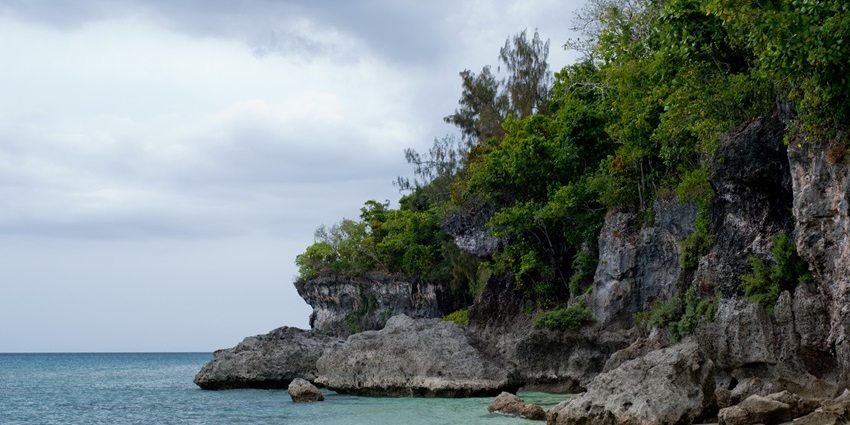 Kayak across Moso Island’s lagoons, gliding through calm waters and lush tropical views.