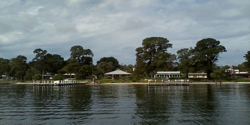 Still waters and a kayak gliding through a lakeside, a tranquil part of things to do in Victoria.