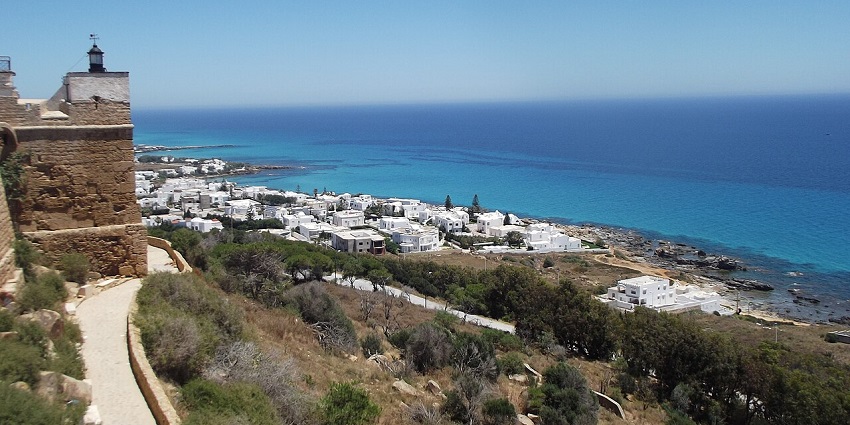 Panoramic view of Kelibia Beach, showcasing its turquoise waters and charm among beaches in Tunisia.