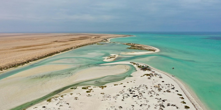 Remote Khuriya Muriya Islands featuring rocky inlets and nesting seabirds.
