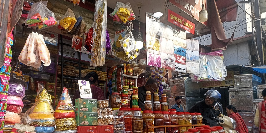 Colourful Kinari Bazaar displaying trims, tassels, sequins, and wedding embellishments.