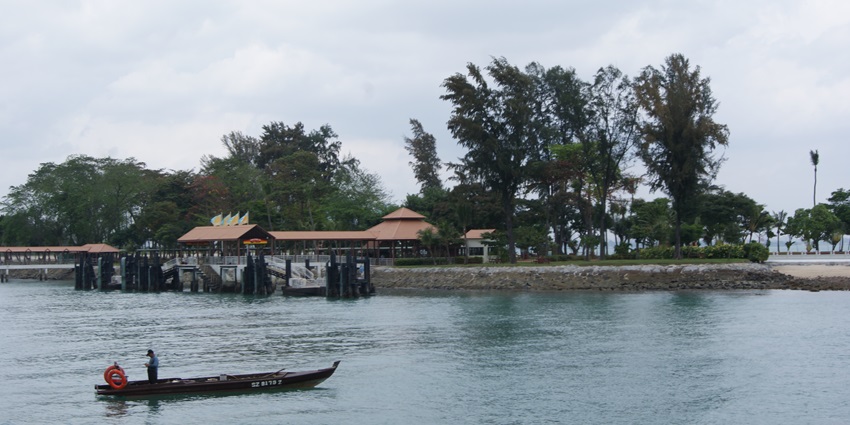 Image of Chinese and Malay shrines amid greenery and lagoons on spiritual Kusu Islan
