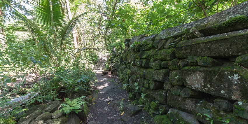 Slow down and discover sacred ruins, forest trails, and calm beaches on peaceful Lelu Island.