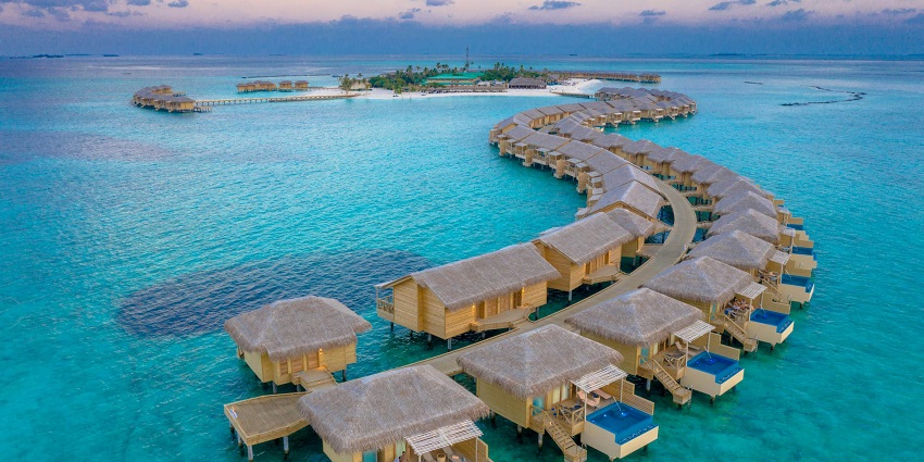 Baa Atoll, a UNESCO Biosphere Reserve, offers rich marine biodiversity, manta rays, and coral reefs.