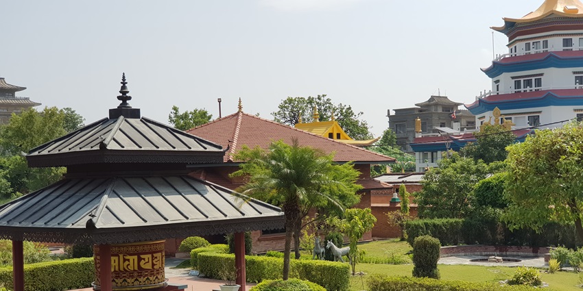 Karma Samteling Monastery in Lumbini, Nepal, with vibrant architecture and serene vibes