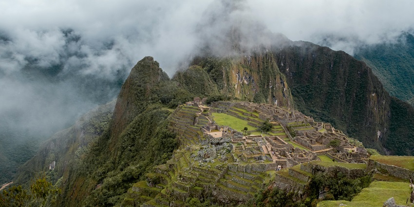 A panoramic view of the citadel, stone terraces, one of the Machu Picchu historical places