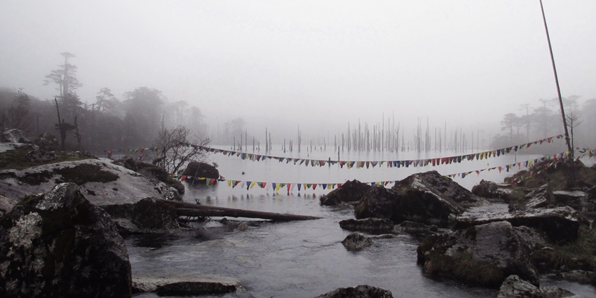 The frozen Madhuri Lake is one of the best places to visit in Tawang in December.