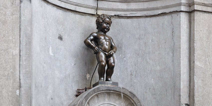 Manneken Pis is a whimsical bronze fountain, one of the iconic monuments in Belgium.