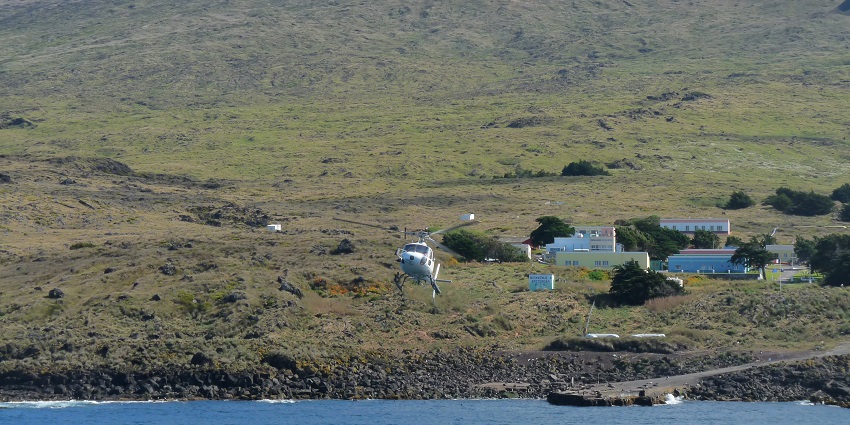 Windswept Marion Island with volcanic terrain and dramatic Southern Ocean waves.
