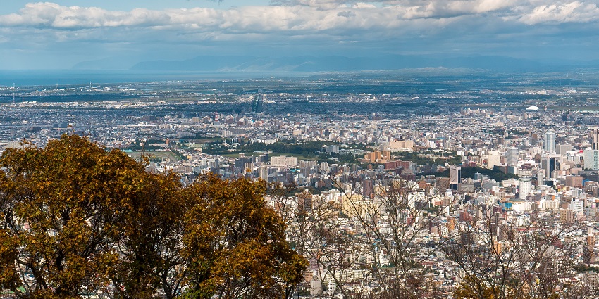 Panoramic view of Sapporo from the mountains, one of the top scenic things to do in Sapporo.