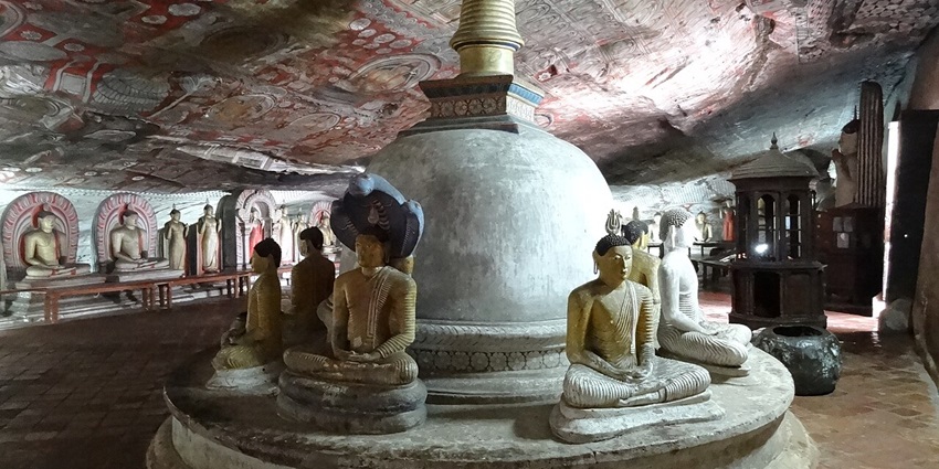 Discover five ancient caves filled with golden Buddha statues and detailed murals.