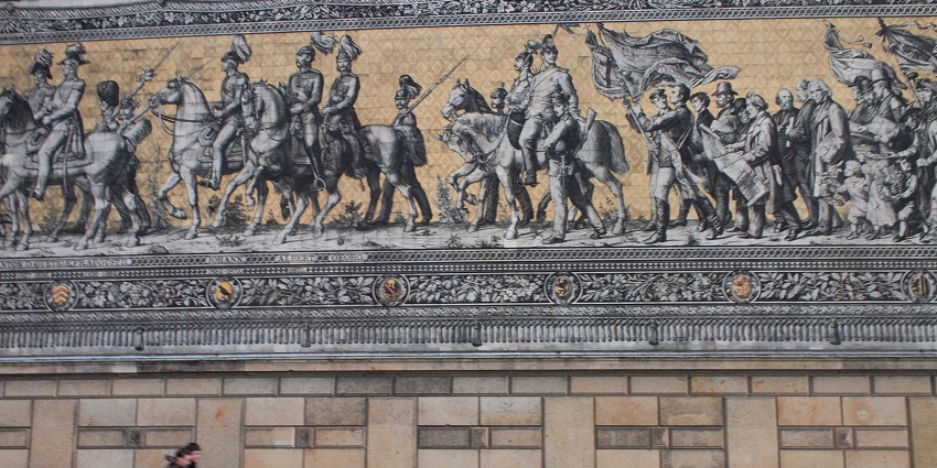 Things to do in Dresden include visiting the impressive Procession of Princes, a tiled mural in Dresden depicting the Saxon royal lineage along a city wall.