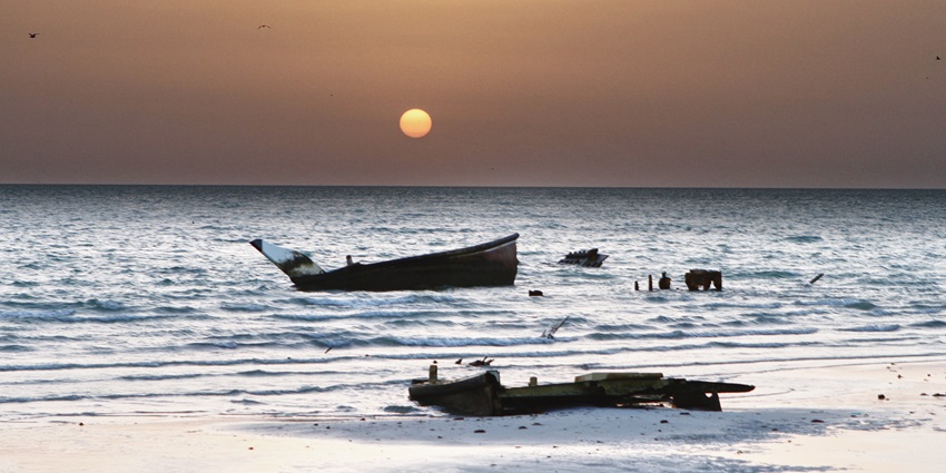 Windswept Masirah Island, one of the top islands in Oman, with sandy dunes and wild coastlines along the Arabian Sea.
