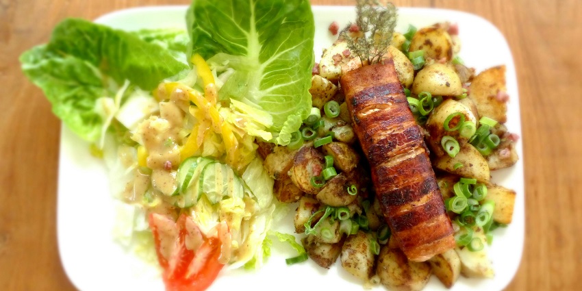 Traditional German meat dish served with sides – what food is famous in Germany.