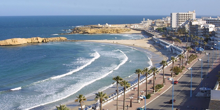 Monastir Beach from above, displaying its pristine shoreline and shimmering Mediterranean waters.